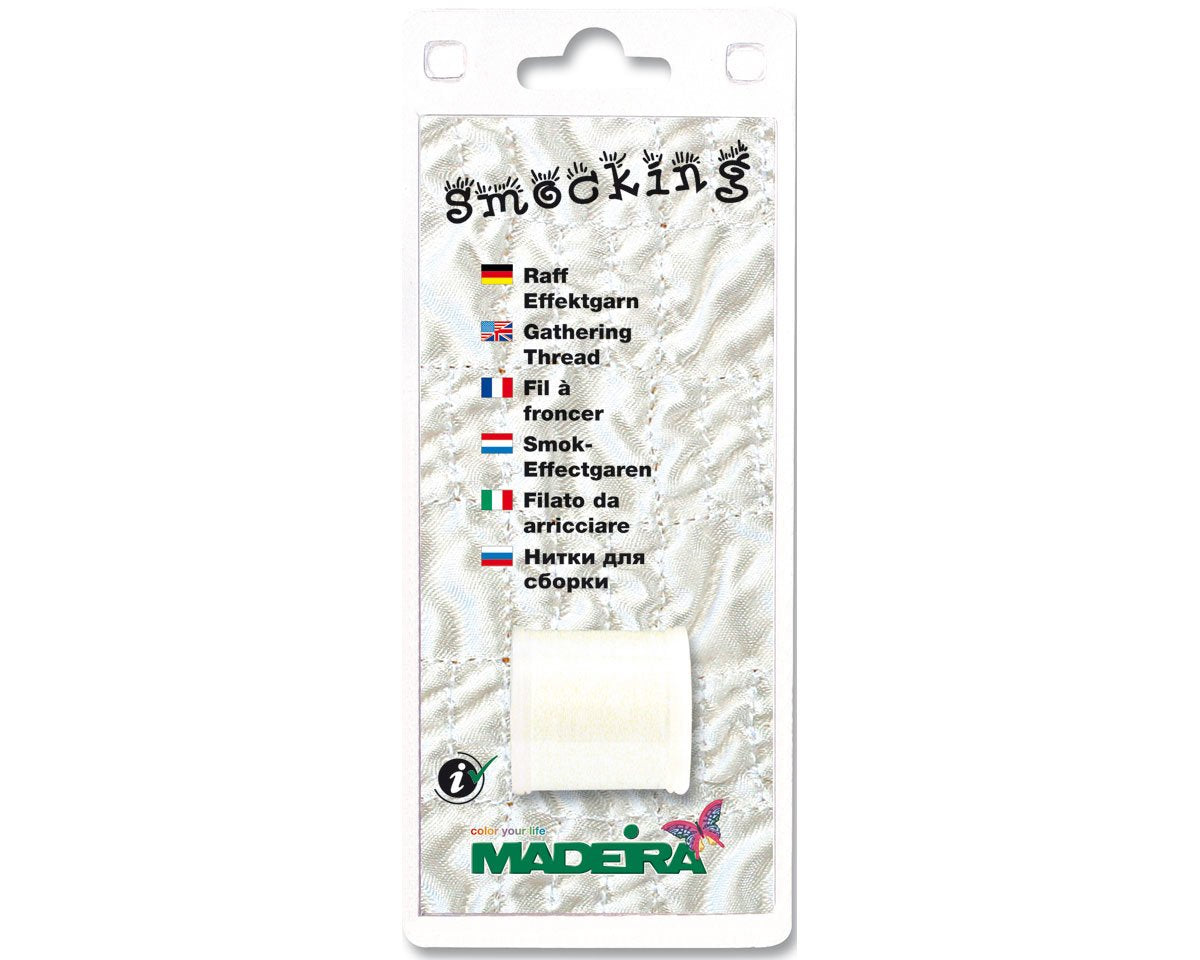 Hilo smocking con efecto arrugado. Con este hilo simplemente cose con él en la zona que quieres arrugar y planchalo y verás como se arruga al instante. madeira 9662.