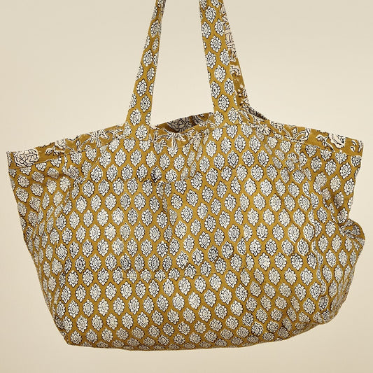 Bolsa reversible mostaza 47 x 21 .