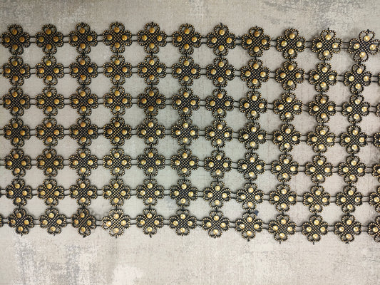 Pasamaneria metálica .