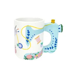 Taza maquina de coser.
