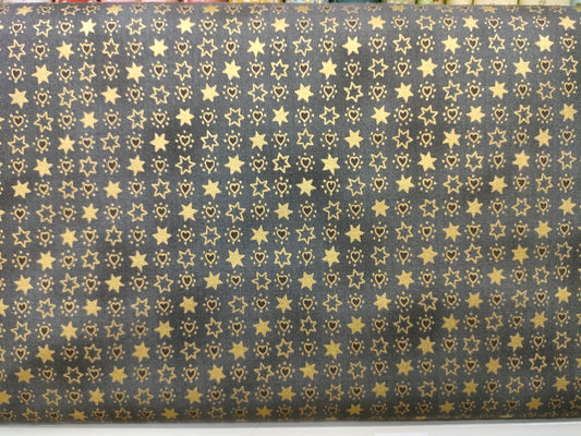 Estrella dorada con piedra