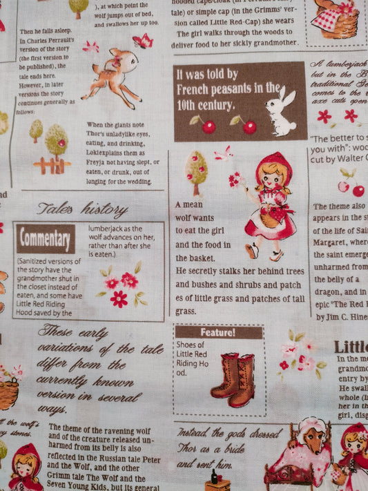 Caperucita roja periódico fondo azul.