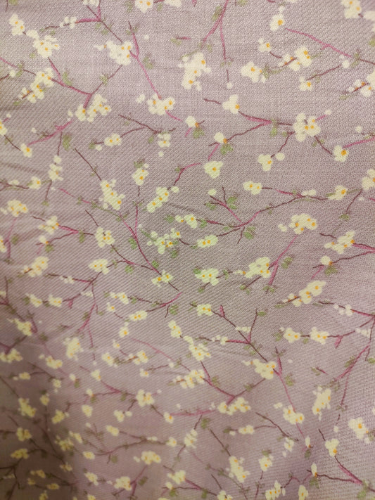 Flores de cerezo con fondo malva